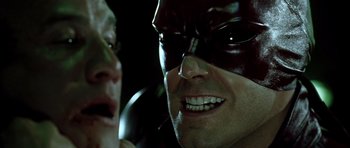 Movie still from “Daredevil” (2003), directed by Mark Steven Johnson – A person wearing a mask; Close Up shot, Over the shoulder angle