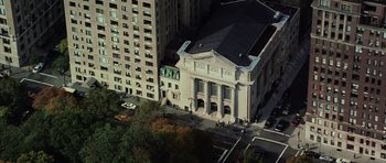 Movie still from “Daredevil” (2003), directed by Mark Steven Johnson – An aerial view of a building in a city; Extreme Wide shot, Overhead angle