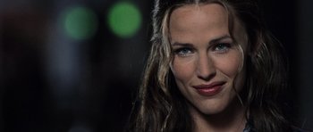 Movie still from “Daredevil” (2003), directed by Mark Steven Johnson – A woman with green eyes; Close Up shot, Over the shoulder angle