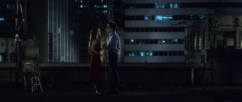 Movie still from “Daredevil” (2003), directed by Mark Steven Johnson – A man and a woman standing next to each other on the street; Wide shot, Over the shoulder angle