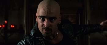 Movie still from “Daredevil” (2003), directed by Mark Steven Johnson – A man with a bald head is looking at the camera; Close Up shot, Low angle