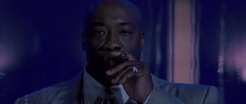 Movie still from “Daredevil” (2003), directed by Mark Steven Johnson – A person holding a cigarette in his mouth; Close Up shot, Low angle