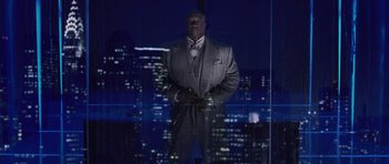 Movie still from “Daredevil” (2003), directed by Mark Steven Johnson – A man standing in front of a window at night; Medium shot, Low angle