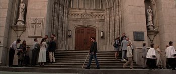 Movie still from “Daredevil” (2003), directed by Mark Steven Johnson – A man walking down the steps of a building; Wide shot, High angle