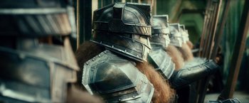 Movie still from “The Hobbit: An Unexpected Journey” (2012), directed by Peter Jackson – View of a group of people wearing armor; Close Up shot, Low angle