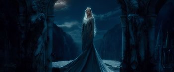 Movie still from “The Hobbit: An Unexpected Journey” (2012), directed by Peter Jackson – A woman dressed as the white witch of the woods; Wide shot, Low angle