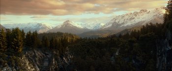 Movie still from “The Hobbit: An Unexpected Journey” (2012), directed by Peter Jackson – A view of a mountain range with snow on the top; Extreme Wide shot, High angle
