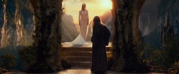 Movie still from “The Hobbit: An Unexpected Journey” (2012), directed by Peter Jackson – A woman standing in front of an old man; Wide shot, Over the shoulder angle