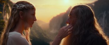 Movie still from “The Hobbit: An Unexpected Journey” (2012), directed by Peter Jackson – A man with a long beard touching a woman's face; Close Up shot, Low angle