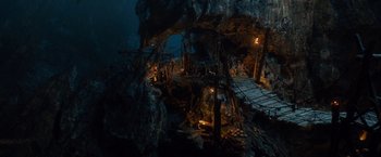Movie still from “The Hobbit: An Unexpected Journey” (2012), directed by Peter Jackson – A cave with a bridge and a lot of lights; Extreme Wide shot, High angle