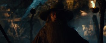 Movie still from “The Hobbit: An Unexpected Journey” (2012), directed by Peter Jackson – A man with a long beard wearing a hat; Close Up shot, Low angle