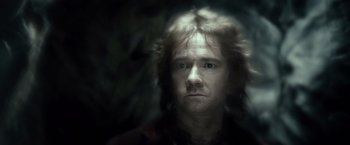 Movie still from “The Hobbit: An Unexpected Journey” (2012), directed by Peter Jackson – A person with long hair; Close Up shot, Over the shoulder angle