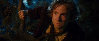 Movie still from “The Hobbit: An Unexpected Journey” (2012), directed by Peter Jackson – A person wearing a jacket; Close Up shot, High angle
