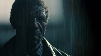 Movie still from “Daredevil” (2015), created by Drew Goddard – A man's face in the rain; Close Up shot, Low angle