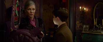 Movie still from “The House with a Clock in Its Walls” (2018), directed by Eli Roth – A woman and a young boy talking to each other; Medium shot, Over the shoulder angle