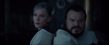 Movie still from “The House with a Clock in Its Walls” (2018), directed by Eli Roth – A man and a woman standing next to each other; Close Up shot, Over the shoulder angle