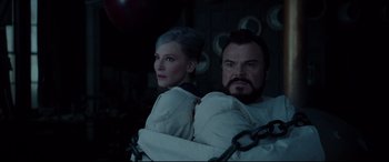 Movie still from “The House with a Clock in Its Walls” (2018), directed by Eli Roth – A man and a woman standing next to each other; Medium shot, High angle