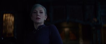 Movie still from “The House with a Clock in Its Walls” (2018), directed by Eli Roth – A woman with blue hair standing in a dark room; Close Up shot, Low angle
