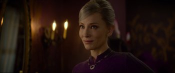 Movie still from “The House with a Clock in Its Walls” (2018), directed by Eli Roth – A person with short hair wearing a necklace; Close Up shot, Over the shoulder angle