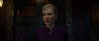 Movie still from “The House with a Clock in Its Walls” (2018), directed by Eli Roth – A woman in a purple shirt is looking to her left; Close Up shot, Over the shoulder angle