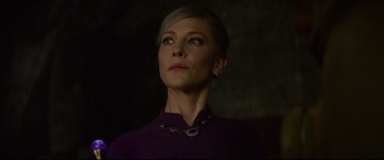 Movie still from “The House with a Clock in Its Walls” (2018), directed by Eli Roth – A woman in a purple sweater looking up at the sky; Close Up shot, Low angle