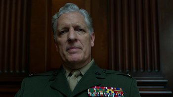 Movie still from “Daredevil” (2015), created by Drew Goddard – A person wearing a uniform; Close Up shot, Low angle