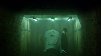 Movie still from “Daredevil” (2015), created by Drew Goddard – A man standing next to a boat in a dark room; Wide shot, Low angle
