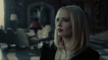 Movie still from “Dark Shadows” (2012), directed by Tim Burton – A woman with blonde hair wearing a black jacket; Close Up shot, Over the shoulder angle