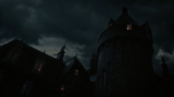Movie still from “Dark Shadows” (2012), directed by Tim Burton – A dark sky with a castle like building in the background; Extreme Wide shot, Low angle