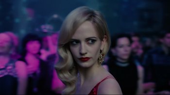 Movie still from “Dark Shadows” (2012), directed by Tim Burton – A woman in a red dress with red lipstick and long blonde hair; Close Up shot, Over the shoulder angle