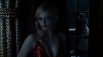 Movie still from “Dark Shadows” (2012), directed by Tim Burton – A woman in a red dress is standing in front of a window; Close Up shot, Over the shoulder angle