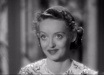 Movie still from “Dark Victory” (1939), directed by Edmund Goulding – A black and white photo of bette davis; Close Up shot, High angle