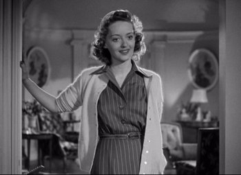 Movie still from “Dark Victory” (1939), directed by Edmund Goulding – A black and white photo of a woman in a room; Medium shot, Low angle