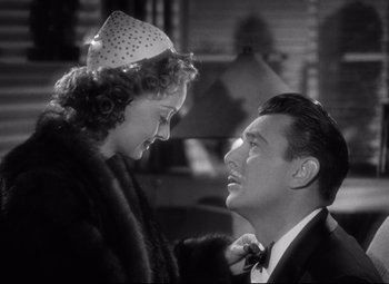 Movie still from “Dark Victory” (1939), directed by Edmund Goulding – A man and a woman looking at one another; Close Up shot, Low angle