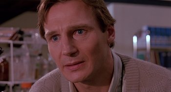 Movie still from “Darkman” (1990), directed by Sam Raimi – A man's face in a sweater; Close Up shot, Low angle