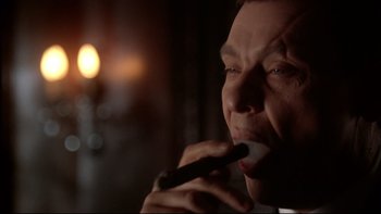 Movie still from “Darkman II: The Return of Durant” (1995), directed by Bradford May – A person brushing his teeth; Close Up shot, Low angle