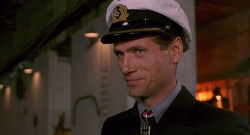 Movie still from “Das Boot” (1981), directed by Wolfgang Petersen – A person wearing a hat; Close Up shot, Low angle