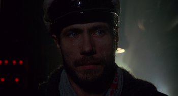 Movie still from “Das Boot” (1981), directed by Wolfgang Petersen – A person wearing a hat; Close Up shot, Low angle