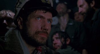 Movie still from “Das Boot” (1981), directed by Wolfgang Petersen – A person wearing a hat; Close Up shot, Low angle