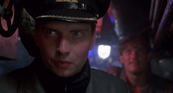 Movie still from “Das Boot” (1981), directed by Wolfgang Petersen – A person wearing a hat; Close Up shot, Low angle