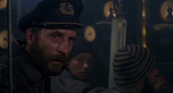 Movie still from “Das Boot” (1981), directed by Wolfgang Petersen – A man and a woman in a uniform; Close Up shot, Low angle
