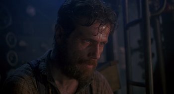Movie still from “Das Boot” (1981), directed by Wolfgang Petersen – A person with a beard; Close Up shot, Low angle