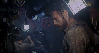 Movie still from “Das Boot” (1981), directed by Wolfgang Petersen – A person in a room; Close Up shot, Over the shoulder angle