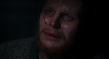 Movie still from “Das Boot” (1981), directed by Wolfgang Petersen – A person with a beard; Close Up shot, Over the shoulder angle