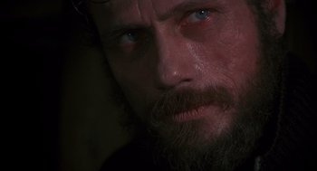 Movie still from “Das Boot” (1981), directed by Wolfgang Petersen – A person with a beard; Close Up shot, Low angle