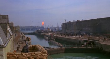 Movie still from “Das Boot” (1981), directed by Wolfgang Petersen – A large body of water near a large city; Extreme Wide shot, High angle