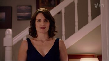Movie still from “Date Night” (2010), directed by Shawn Levy – A woman standing in front of a white staircase; Close Up shot, Over the shoulder angle