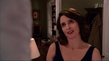 Movie still from “Date Night” (2010), directed by Shawn Levy – A person wearing a necklace; Close Up shot, Over the shoulder angle