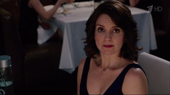 Movie still from “Date Night” (2010), directed by Shawn Levy – A person sitting at a table; Close Up shot, Over the shoulder angle