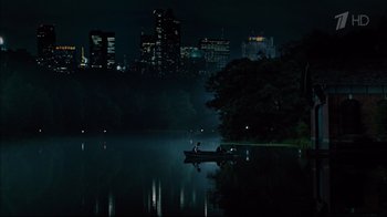 Movie still from “Date Night” (2010), directed by Shawn Levy – Two people in a boat on a body of water at night; Extreme Wide shot, High angle